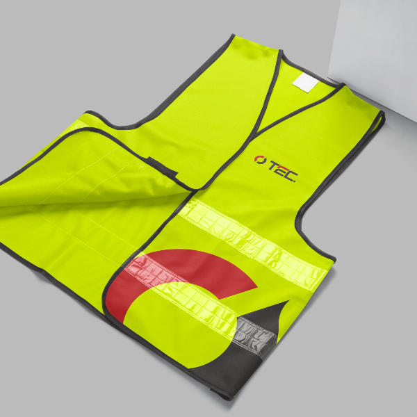 A yellow safety vest with red and black stripes.